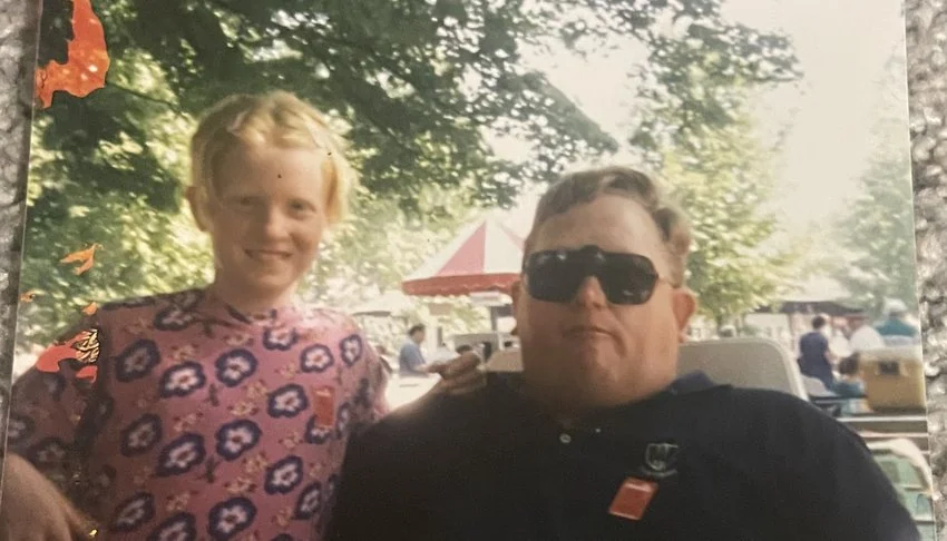 Frank sharing a race day with a young fan.